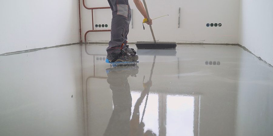 worker flattens the epoxy