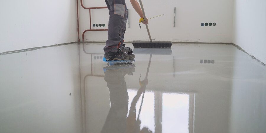 worker flattens the epoxy